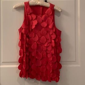 Red sleeveless blouse
